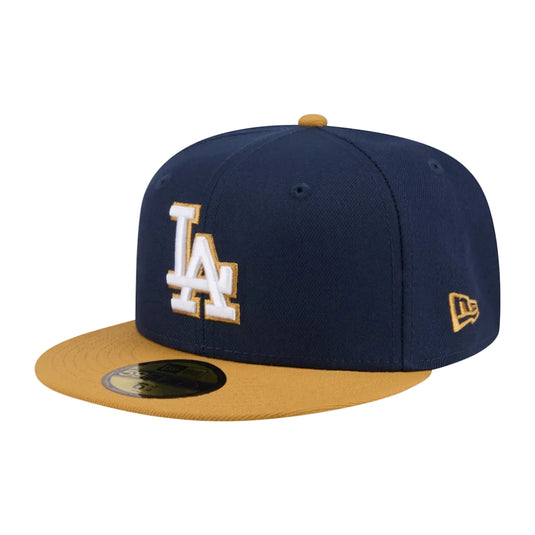 Navy and gold baseball cap with LA logo on a white background
