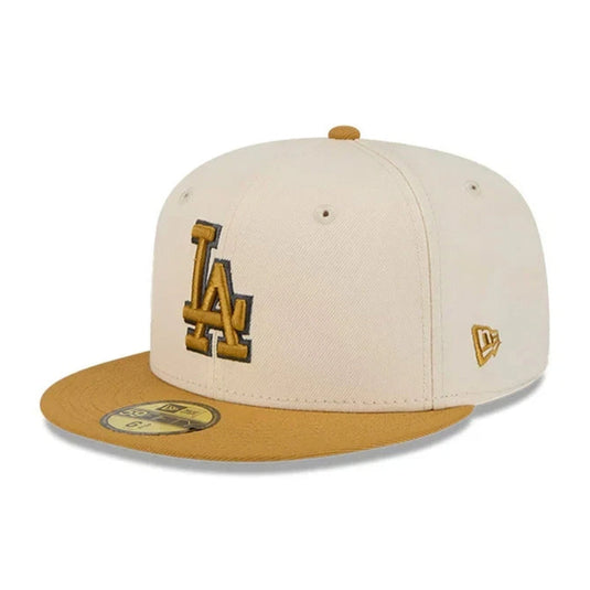 Beige and brown Dodgers cap with LA logo on a white background