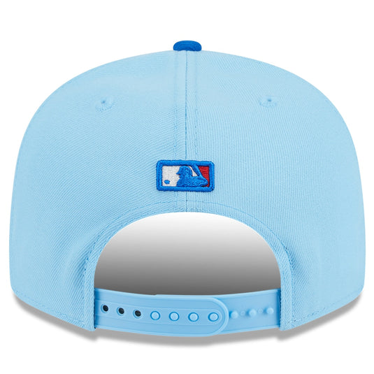 Light blue baseball cap with a logo on the back against a white background
