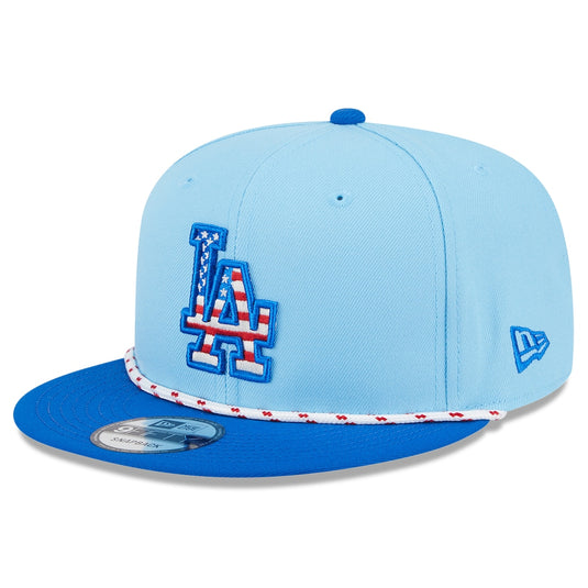 Blue 2tone Dodgers cap with an American flag themed logo and a red and white rope across the visor. 