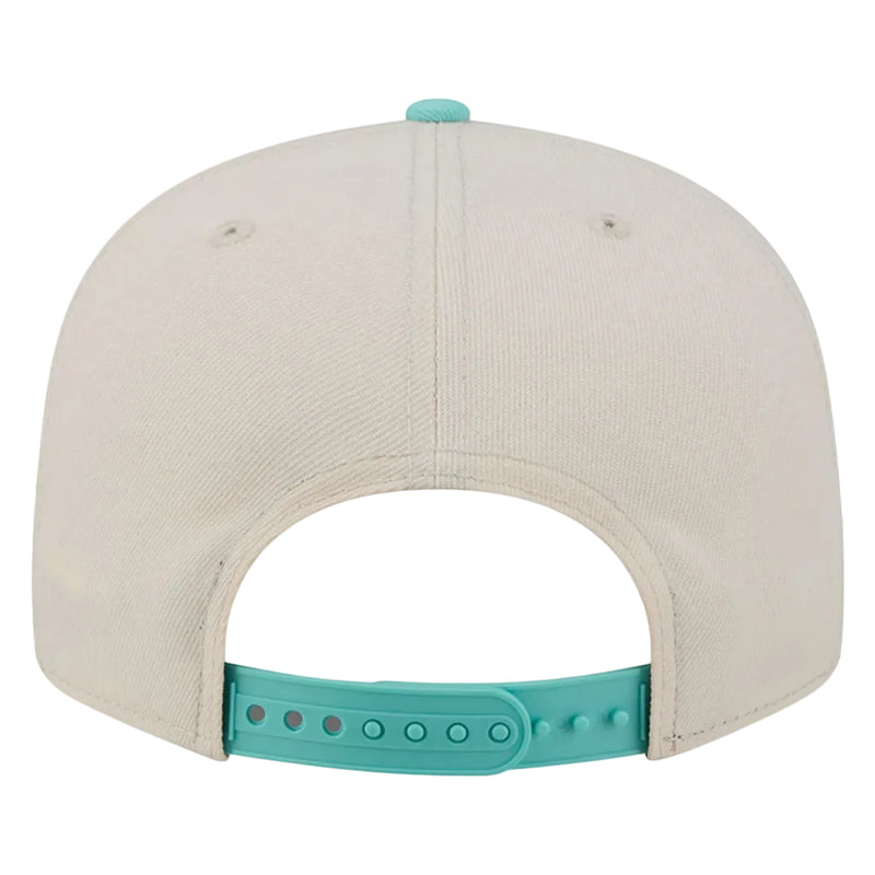 Load image into Gallery viewer, Back view of a baseball cap in off-white with a turquoise adjustable strap and matching top button, shown on a white background.
