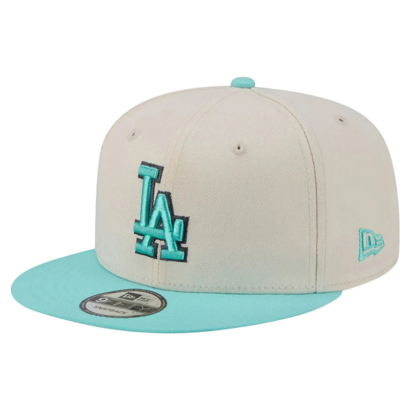 Load image into Gallery viewer, Off white Dodgers snapback with light blue visor, 'LA' logo, and button
