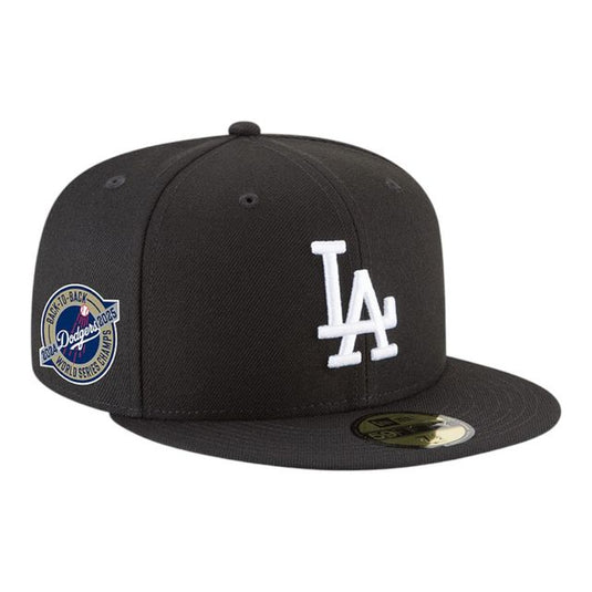 Black baseball cap with LA logo on a white background