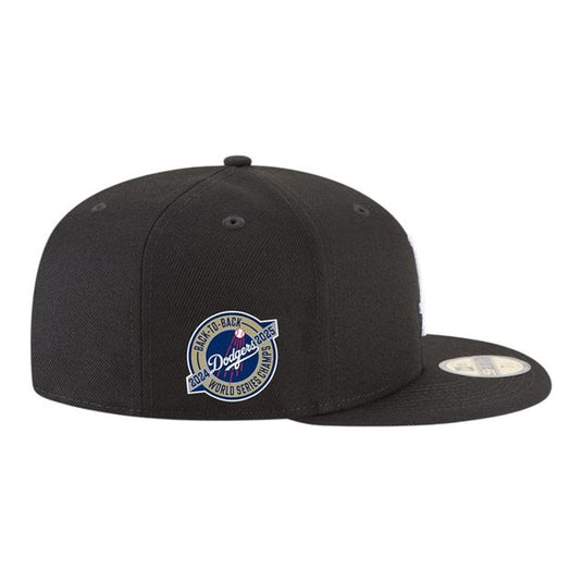 Black baseball cap with a 'World Series Back-to-Back' patch on a white background