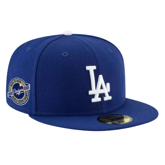 Blue Dodgers cap with a World Series Back-to-Back patch on a white background