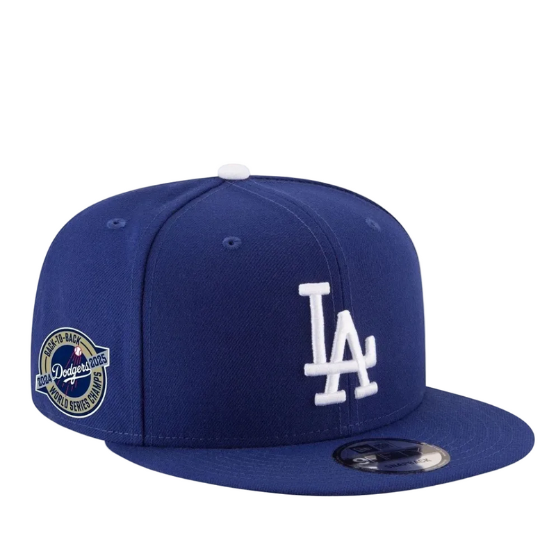 Load image into Gallery viewer, Blue Dodgers cap with white logo and a World Series Back-to-Back Patch on the side on a white background

