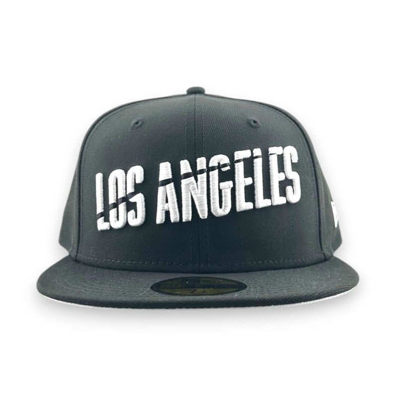 Load image into Gallery viewer, Black cap with 'Los Angeles' text on a white background
