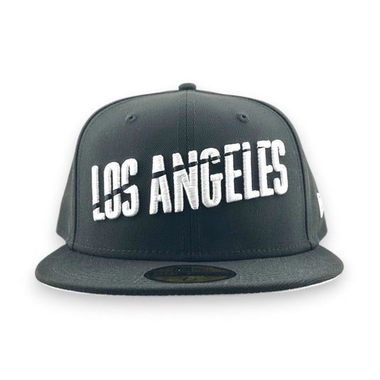 Black cap with 'Los Angeles' text on a white background
