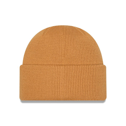 A classic ribbed knit cuffed beanie hat in a warm camel or ochre color, presented on a clean white background with a subtle drop shadow.