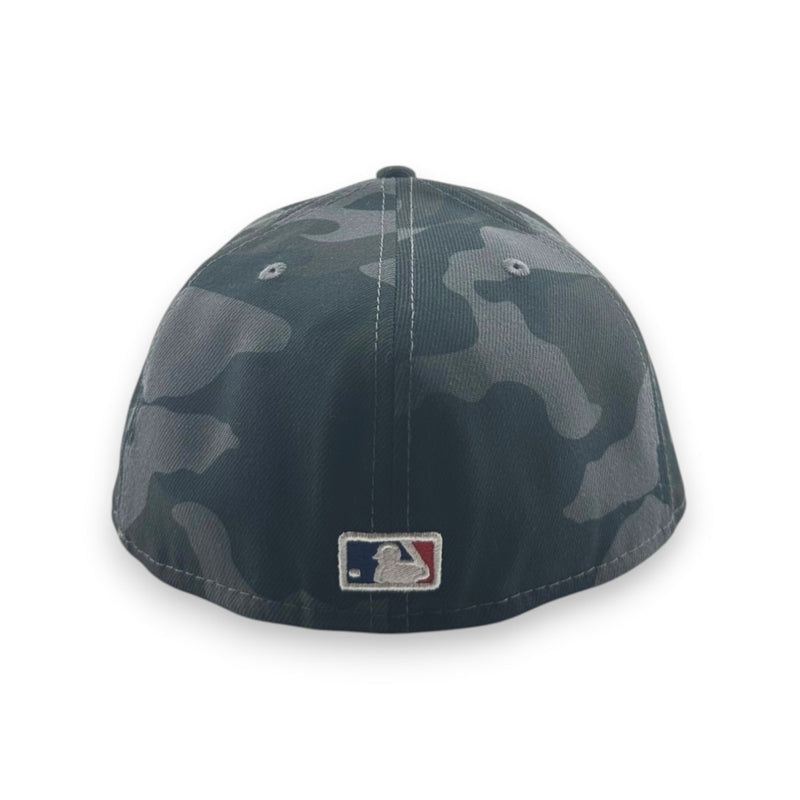 Load image into Gallery viewer, Camouflage-patterned baseball cap with MLB logo on a white background
