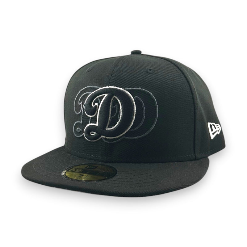 Load image into Gallery viewer, Black Dodgers cap with a triple overlapping 'D' logo on a white background
