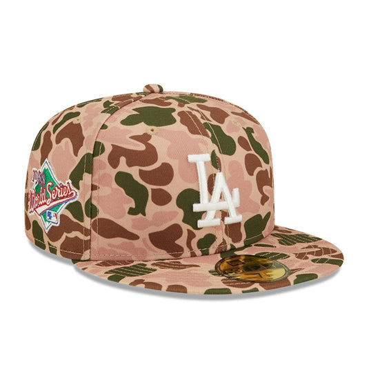 Camouflage baseball cap with 'LA' logo on a white background