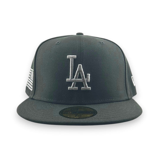 Black baseball cap with LA logo on a white background