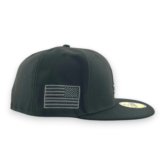 Black cap with an American flag patch on a white background