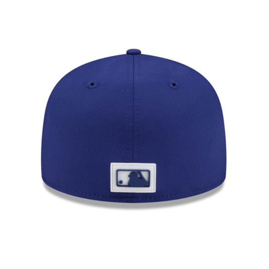 Blue baseball cap with a logo on a white background