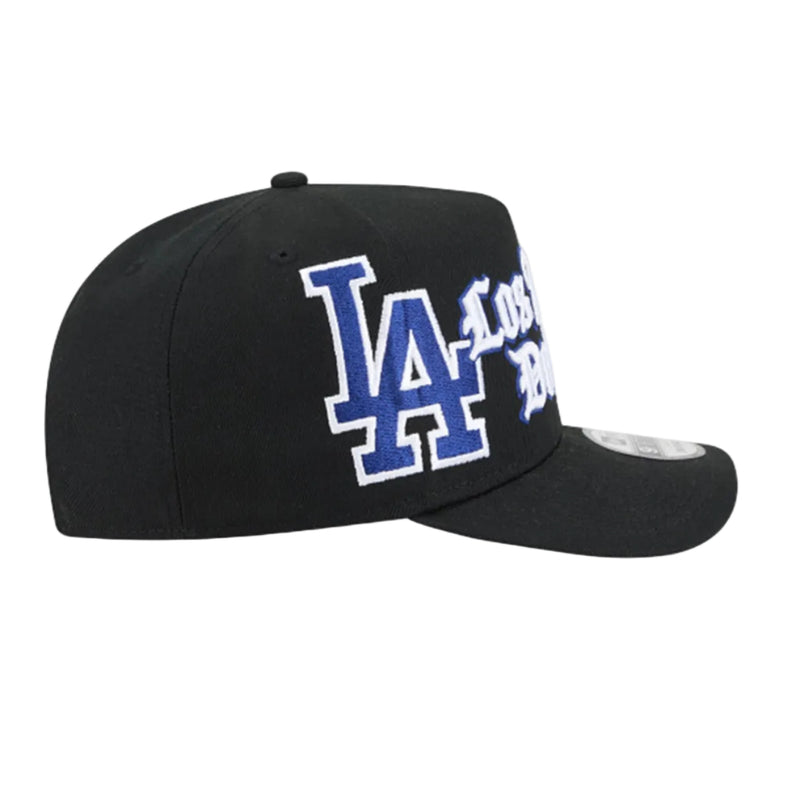 Load image into Gallery viewer, A black baseball cap featuring a blue and white embroidered 'LA' logo with 'Los Angeles' text on the front, shown against a plain white background.
