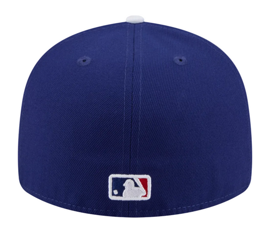 Blue baseball cap with MLB logo on a white background
