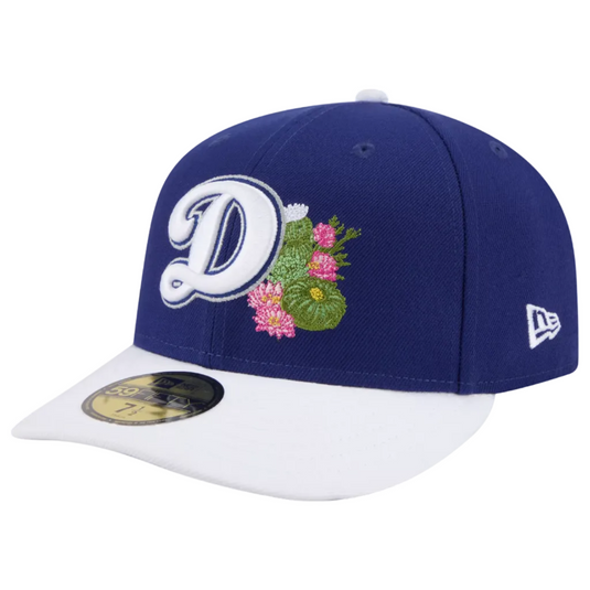 Blue and white baseball cap with floral design and 'D' logo on a white background