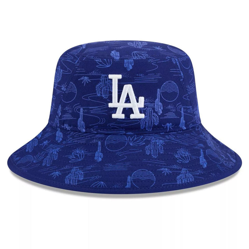 Load image into Gallery viewer, A royal blue bucket hat featuring an all-over desert-themed pattern in lighter blue, with a white embroidered 'LA' logo on the front, representing the Los Angeles Dodgers.
