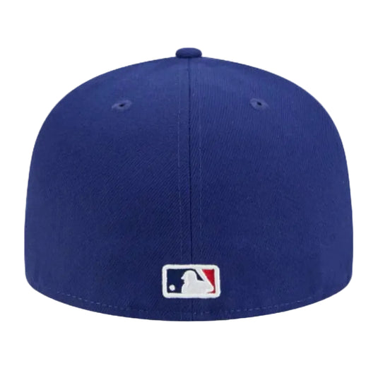 Blue baseball cap with MLB logo on a white background