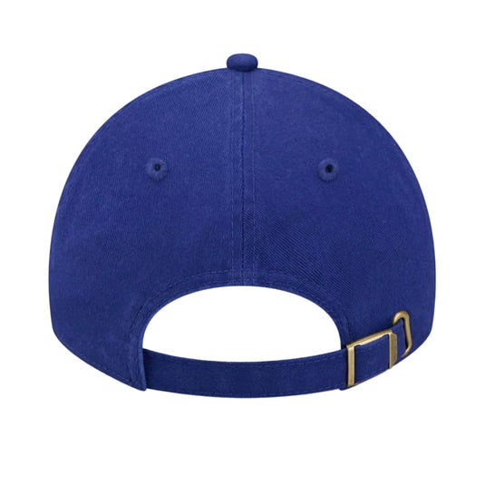 A royal blue baseball cap shown from the back, featuring a gold-tone metal buckle on the adjustable strap, set against a plain white background.