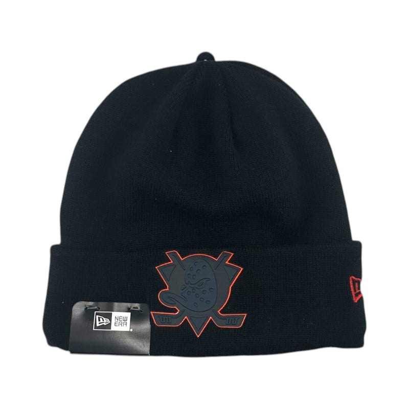 Load image into Gallery viewer, A black knit beanie hat featuring a dark gray and red embroidered logo on the front cuff, a small red New Era flag on the side, and a black hangtag attached near the cuff.
