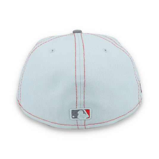 Light gray baseball cap with a logo on a white background