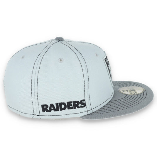 Light gray cap with 'RAIDERS' text on a white background