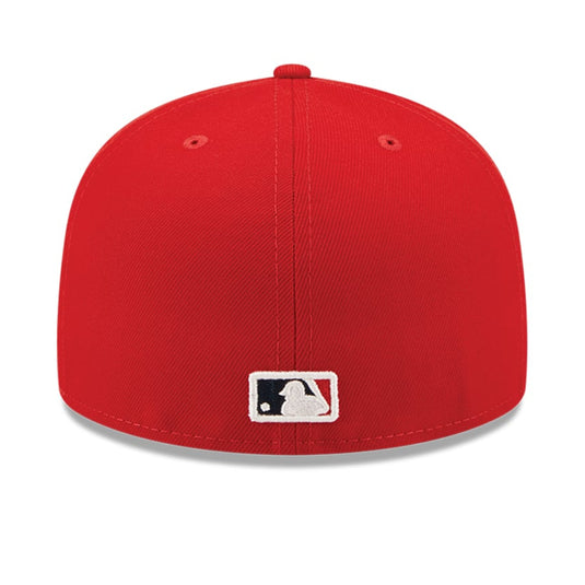 Red baseball cap with MLB logo on a white background