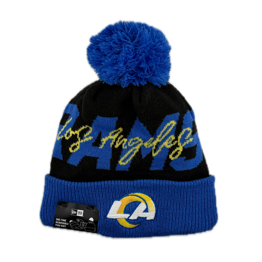 Blue and black beanie with pom-pom and 'Los Angeles' yellow text on top of a blue 