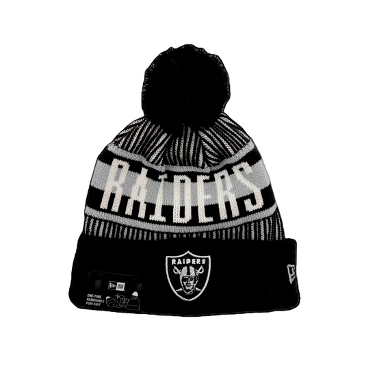 New Era NFL Knitstripe D3 Raiders pom-pom knit beanie with Raiders logo on cuff. 