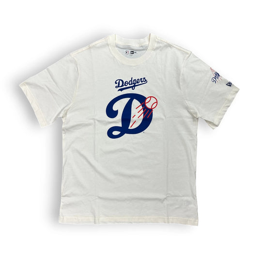 A white Los Angeles Dodgers short-sleeve t-shirt featuring a large navy blue 'D' logo with a red signature on the front, and a smaller 'Dodgers' script logo above it.