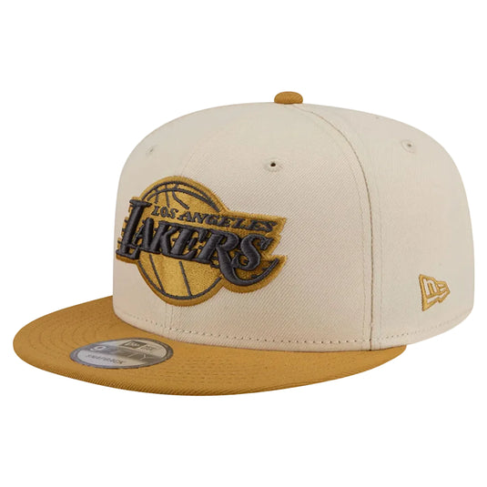 Beige and gold Los Angeles Lakers cap on a white background