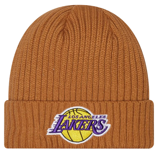 A ribbed knit beanie hat in a warm rust or burnt orange color, featuring the embroidered Los Angeles Lakers logo on the front cuff.