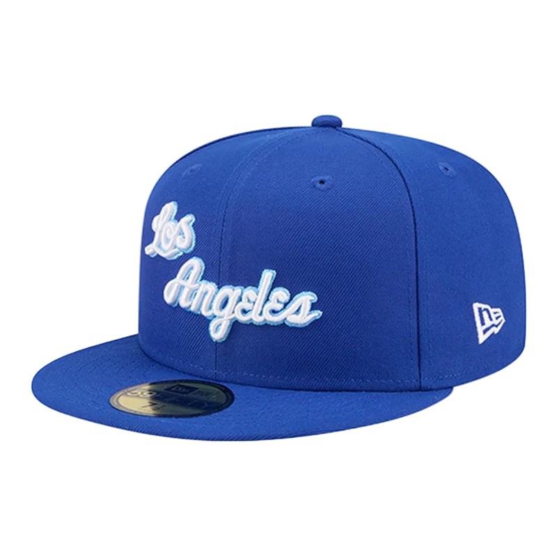 Load image into Gallery viewer, Blue baseball cap with 'Los Angeles' text on a white background
