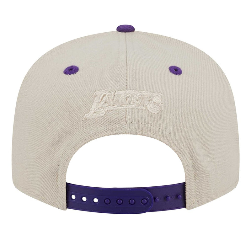 Load image into Gallery viewer, Back view of a Los Angeles Lakers baseball cap in off-white with purple accents on the button, eyelets, and adjustable strap.
