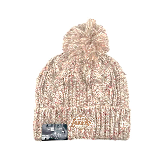 A New Era Los Angeles Lakers cable-knit beanie hat in a beige and pink marled colorway, featuring a matching pom-pom on top and the team logo embroidered on the front cuff.