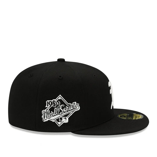 Black A's cap with '1989 World Series' logo on a white background