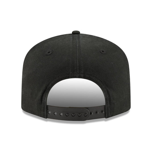 The back view of a black snapback cap on a solid white background.