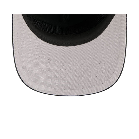 Closeup shot of the gray undervisor of a New Era 19Twenty Snapback cap