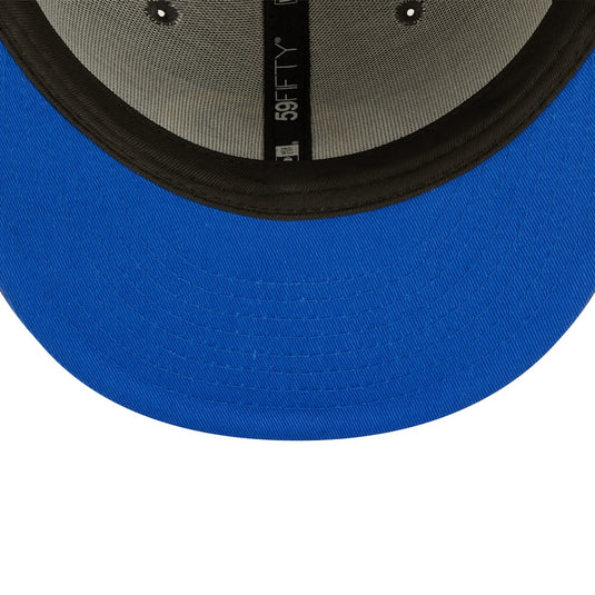 Blue baseball cap with '59Fifty' logo on a white background