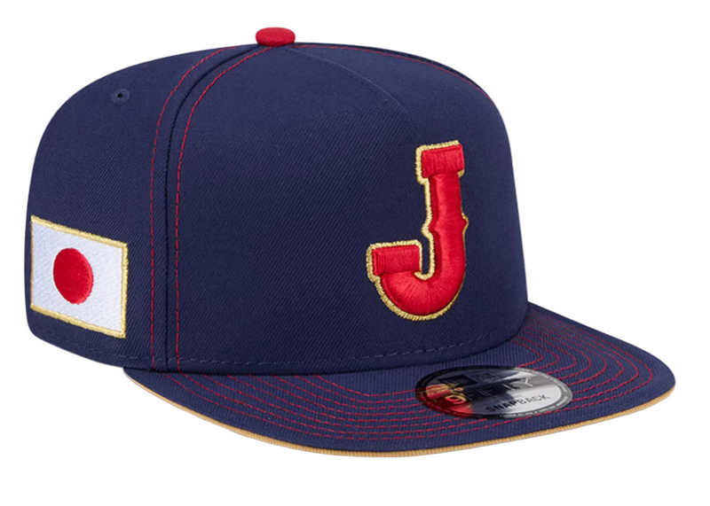Load image into Gallery viewer, Navy and Red hat the an embroidered 'J' on the front and the Japan Flag Patch on the side. Hat has red stitching. 
