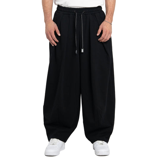 Pro Club heavy wide volume fit jersey comfort black pants with pleats and tapered ankles. 