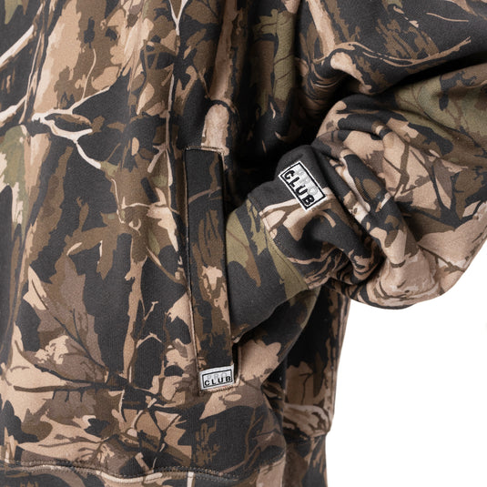 Camouflage jacket with visible Pro Club branding on a white background