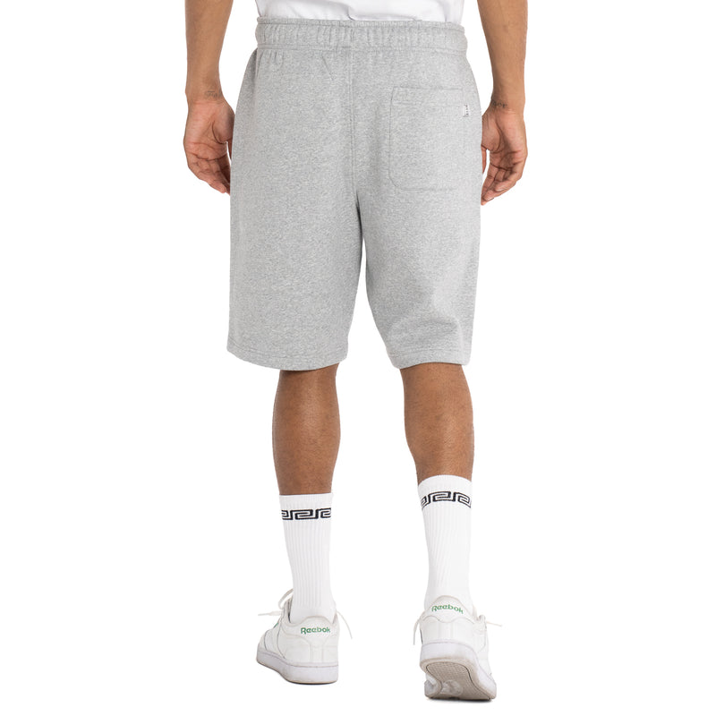 Load image into Gallery viewer, Back shot of person wearing heather gray sweat shorts with one rear pocket for the right leg on a white background
