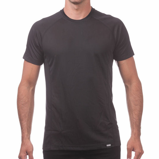 Man wearing a black athletic shirt and pants on a white background