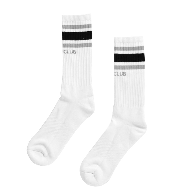 Load image into Gallery viewer, White socks with black and gray stripes on a white background
