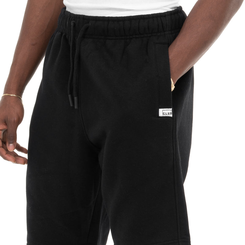 Load image into Gallery viewer, Close up of the Pro Club heavyweight sweat shorts with the pro club logo embroidered on the left front pocket on a white background
