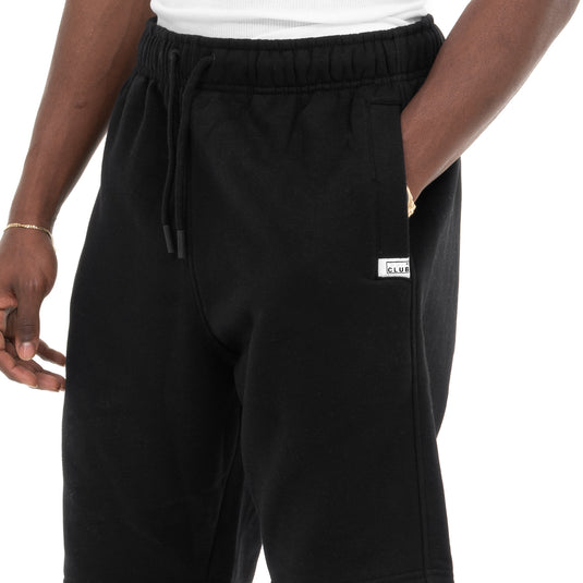 Close up of the Pro Club heavyweight sweat shorts with the pro club logo embroidered on the left front pocket on a white background