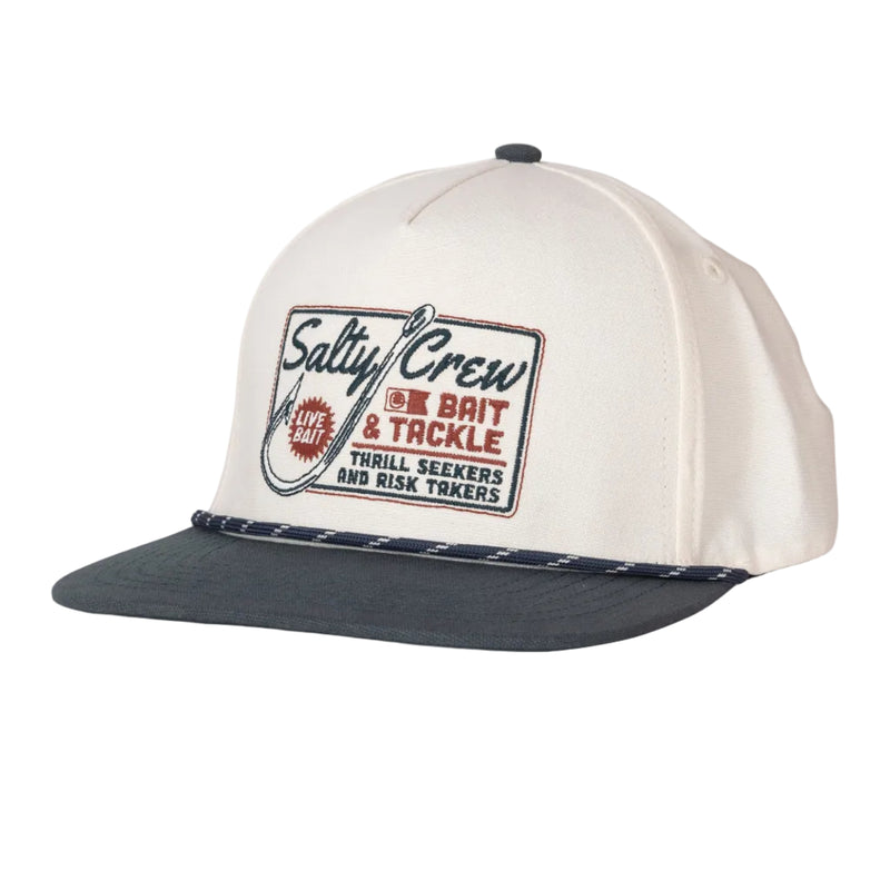 Load image into Gallery viewer, An off-white structured baseball cap with a dark navy flat brim and a front patch reading 'Salty Crew'. The cap is photographed on a clean, light gray background.
